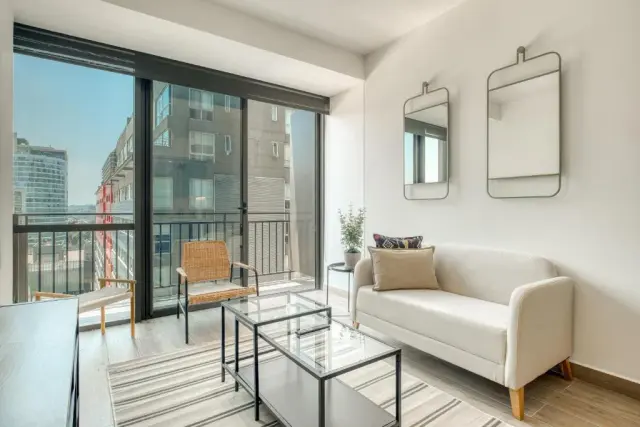 One-Bedroom Apartment with Balcony and City View
