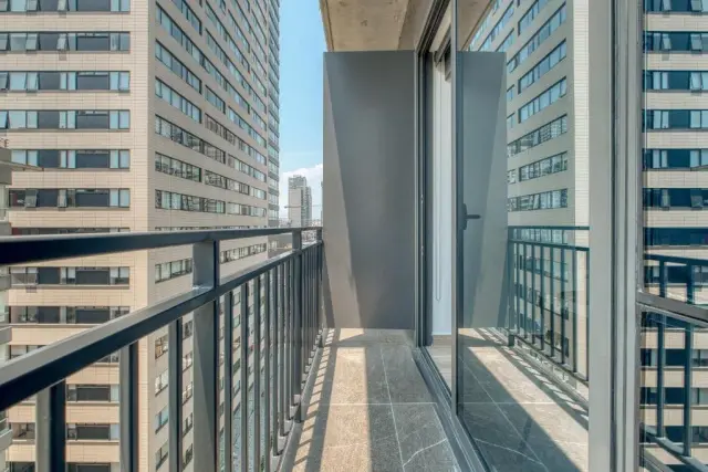 One-Bedroom Apartment with Balcony and City View