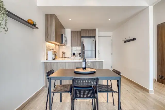 One-Bedroom Apartment with Balcony and City View